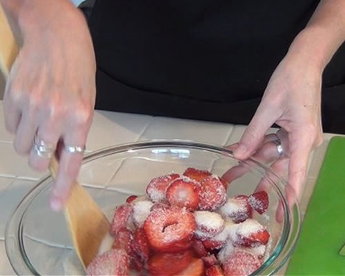 In a large bowl, mix the strawberries and majority of the sugar; allow the berries to stand for an hour.
