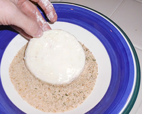 Place the flour, milk and bread crumbs into separate bowls; dredge the eggplant into each bowl in that order.