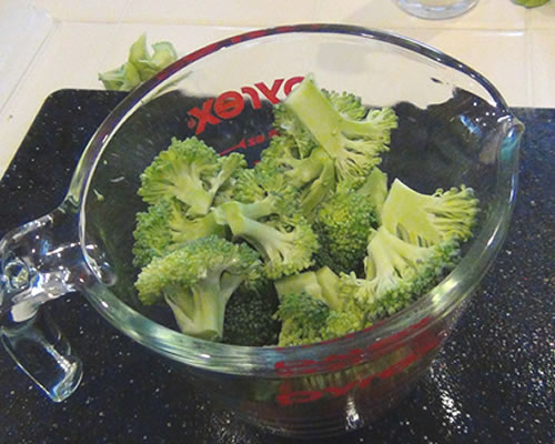Cut the broccoli into segments; reserve one-third (about 1 cup for 6 servings) of the broccoli (florets).