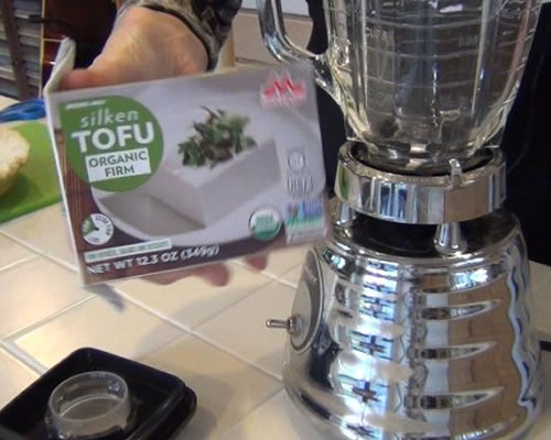Blend the tofu in a blender until smooth.