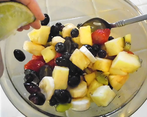 Sprinkle the fruit with the lime juice, mix, chill and serve.