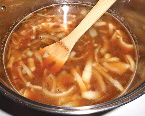 Add the broth, soy sauce and remaining ingredients to the pan; stir well and bring the soup to a boil. Reduce the heat to low and simmer (covered) until the onions are tender.