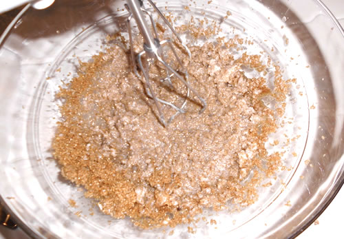 In a medium bowl, combine the sugar and buttery spread; beat with a mixer at medium speed until smooth.