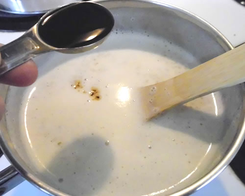 Remove from the heat and stir in the vanilla; allow to cool for 20 minutes and stir again.