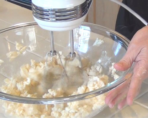 In a large bowl, cream the buttery spread and sugar with a mixer at medium to high speed until light and fluffy.