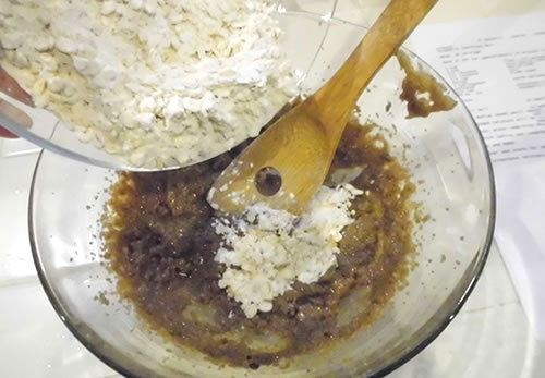Add the flour mixture to the buttery spread mixture; stir until well blended (mixture will be crumbly).