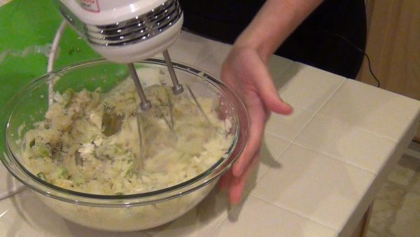 Add the remaining ingredients and whip with a hand mixer until well blended and creamy. Garnish with additional parsley and paprika; keep warm until ready to serve.