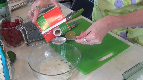 Combine the milk, lime juice, and lime zest; set aside for 5 minutes. Whisk in the oil, sour cream and vanilla.