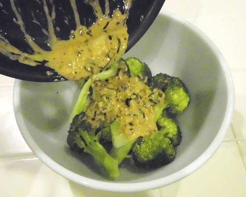 Drizzle the vinaigrette over the broccoli and toss gently until coated.