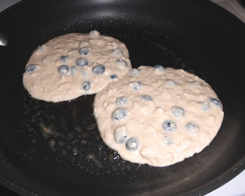 Drop 1/4 cup to 1/3 cup of the batter onto a hot greased pan; cook until the batter bubbles, flip and cook for another 3-4 minutes until brown on the other side. Repeat in batches.