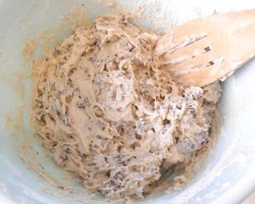 Add the flour mixture, walnuts and dates to the buttery spread mixture; mix until well combined.