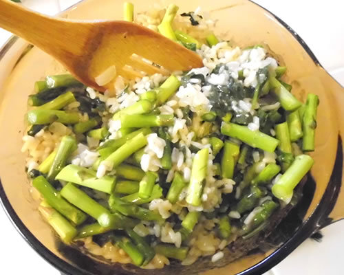 Stir in the asparagus, sprinkle with the remaining cheese; cover and bake an additional 15 minutes.