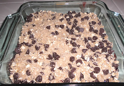 Sprinkle the chocolate chip mixture on top and bake at 375 degrees for approximately 30 minutes or until golden brown.