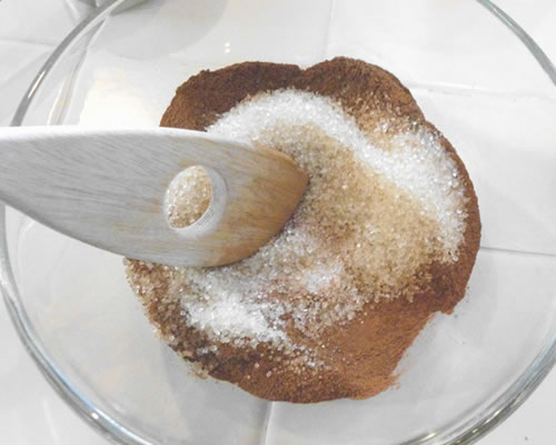 In a small bowl, mix the sugar and cinnamon for the topping.